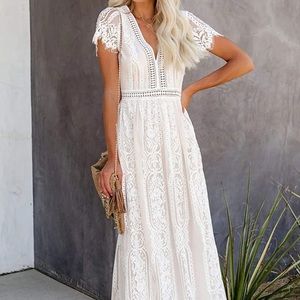 Medium white/ivory lace short sleeve wedding dress